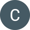 A dark gray circular icon with a white letter C in the center.
